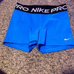 woman’s blue nike pro shorts size medium